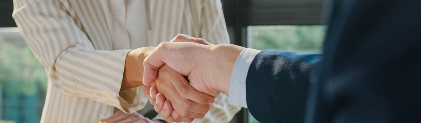 lawyer and client shaking hands